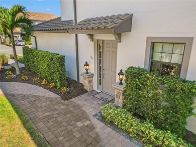 Beautifully maintained End unit condominium. Experience on Esplanade Golf and Country at Lakewood Ranch in Florida - for sale on GolfHomes.com, golf home, golf lot