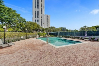 Live in the heart of a country club oasis without the country on Turnberry Isle Resort and Club in Florida - for sale on GolfHomes.com, golf home, golf lot