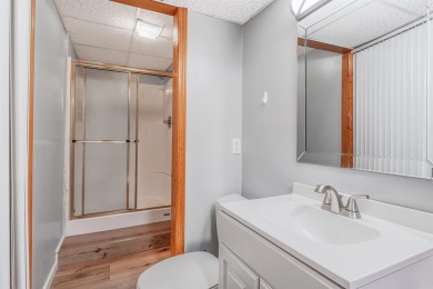 Nestled at the end of a peaceful dead-end street, this inviting on Mountain Ranch Golf Club in Arkansas - for sale on GolfHomes.com, golf home, golf lot