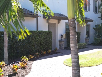 Beautifully maintained End unit condominium. Experience on Esplanade Golf and Country at Lakewood Ranch in Florida - for sale on GolfHomes.com, golf home, golf lot