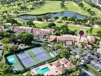 Live in the heart of a country club oasis without the country on Turnberry Isle Resort and Club in Florida - for sale on GolfHomes.com, golf home, golf lot