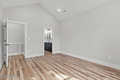 This adorable home is so full of sass... Spacious open floorplan on Pearl Golf Links in North Carolina - for sale on GolfHomes.com, golf home, golf lot