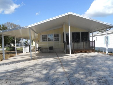 Charming two bedroom, one and a half bathroom home in the Bass on Polo Park East in Florida - for sale on GolfHomes.com, golf home, golf lot