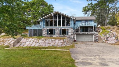 Take a look at this Pelican Lake log cabin, situated on the 19th on Breezy Point Golf Course Resort in Minnesota - for sale on GolfHomes.com, golf home, golf lot