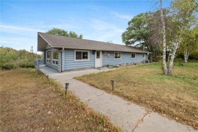 Take a look at this Pelican Lake log cabin, situated on the 19th on Breezy Point Golf Course Resort in Minnesota - for sale on GolfHomes.com, golf home, golf lot