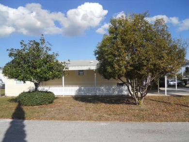 Charming two bedroom, one and a half bathroom home in the Bass on Polo Park East in Florida - for sale on GolfHomes.com, golf home, golf lot