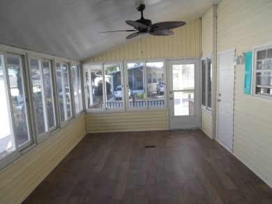 Charming two bedroom, one and a half bathroom home in the Bass on Polo Park East in Florida - for sale on GolfHomes.com, golf home, golf lot