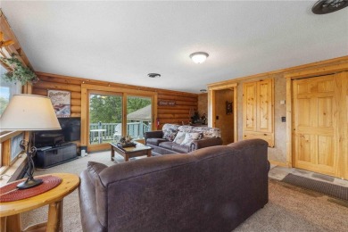 Take a look at this Pelican Lake log cabin, situated on the 19th on Breezy Point Golf Course Resort in Minnesota - for sale on GolfHomes.com, golf home, golf lot