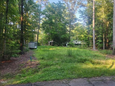 Escape to nature with this versatile multi-use lot located in on River Golf and County Club at Lake Royale in North Carolina - for sale on GolfHomes.com, golf home, golf lot