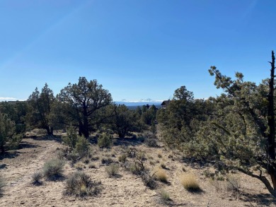 With beautiful views of the Cascade Mountains, this home site on Brasada Canyons Golf Course in Oregon - for sale on GolfHomes.com, golf home, golf lot