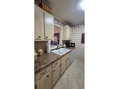 Discover Paradise in Fairfield Bay, AR: Your Private Pool Condo on Indian Hills Country Club in Arkansas - for sale on GolfHomes.com, golf home, golf lot