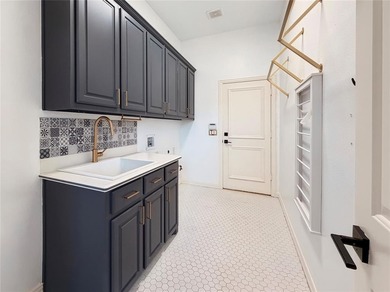 Welcome to your dream home! A stately residence nestled in the on Hackberry Creek Country Club in Texas - for sale on GolfHomes.com, golf home, golf lot