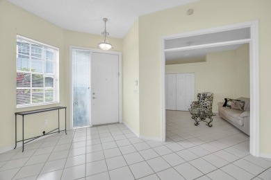 Fabulous opportunity for first floor living in a spacious condo on Wycliffe Golf and Country Club in Florida - for sale on GolfHomes.com, golf home, golf lot