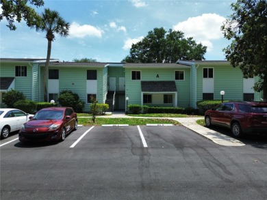 2nd floor condo located in the 55+ community of Live Oak Village on Country Club At Silver Springs Shores in Florida - for sale on GolfHomes.com, golf home, golf lot