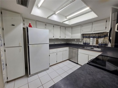 2nd floor condo located in the 55+ community of Live Oak Village on Country Club At Silver Springs Shores in Florida - for sale on GolfHomes.com, golf home, golf lot