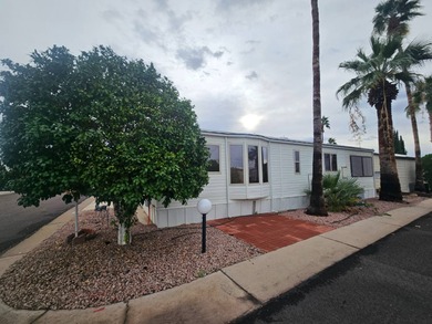 This charming 1-bedroom, 1.5-bathroom home with an Arizona room on Viewpoint Golf Resort in Arizona - for sale on GolfHomes.com, golf home, golf lot