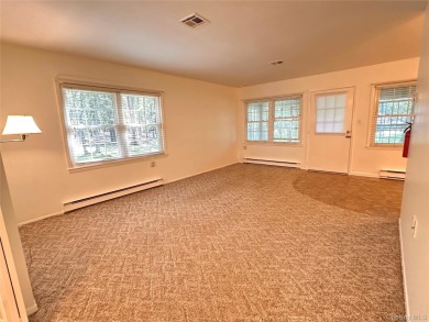 This corner Greenbriar model offers the perfect combination of on Leisure Village Golf Course in New York - for sale on GolfHomes.com, golf home, golf lot