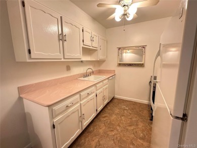 This corner Greenbriar model offers the perfect combination of on Leisure Village Golf Course in New York - for sale on GolfHomes.com, golf home, golf lot