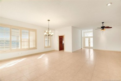 Absolutely Beautiful & stylish LAKEFRONT Divosta built home on Monarch Country Club in Florida - for sale on GolfHomes.com, golf home, golf lot
