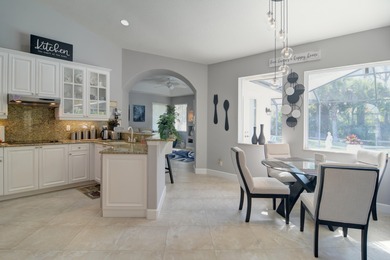 Stunning 3 bedroom, 3.5 pool home situated on an estate lot on Meadowood Golf and Tennis Club in Florida - for sale on GolfHomes.com, golf home, golf lot