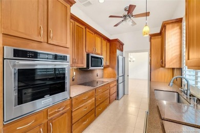 Absolutely Beautiful & stylish LAKEFRONT Divosta built home on Monarch Country Club in Florida - for sale on GolfHomes.com, golf home, golf lot