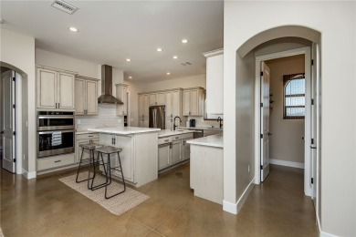 Located at 6322 S Via De Oro, Fort Mohave, Arizona, this on Los Lagos Golf Club in Arizona - for sale on GolfHomes.com, golf home, golf lot