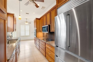 Absolutely Beautiful & stylish LAKEFRONT Divosta built home on Monarch Country Club in Florida - for sale on GolfHomes.com, golf home, golf lot