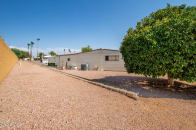 Tucked away on a private corner cul-de-sac lot, this beautifully on Fountain of the Sun Country Club in Arizona - for sale on GolfHomes.com, golf home, golf lot