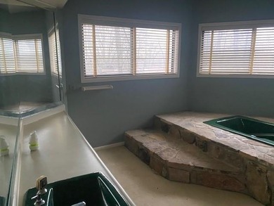 EXCELLENT OPPORTUNITY FOR REHAB AND FILP OR SWEAT EQUITY on Rivermont Golf and Country Club in Georgia - for sale on GolfHomes.com, golf home, golf lot