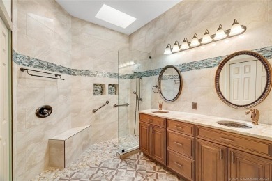 Absolutely Beautiful & stylish LAKEFRONT Divosta built home on Monarch Country Club in Florida - for sale on GolfHomes.com, golf home, golf lot