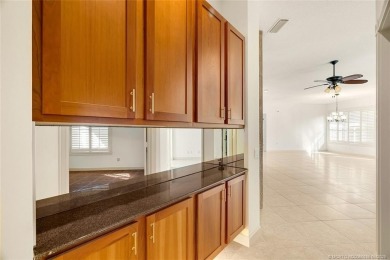 Absolutely Beautiful & stylish LAKEFRONT Divosta built home on Monarch Country Club in Florida - for sale on GolfHomes.com, golf home, golf lot
