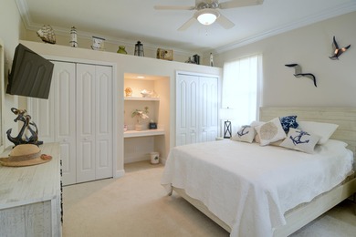 Stunning 3 bedroom, 3.5 pool home situated on an estate lot on Meadowood Golf and Tennis Club in Florida - for sale on GolfHomes.com, golf home, golf lot