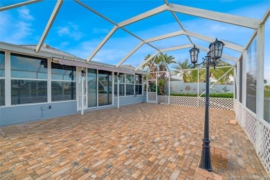 Absolutely Beautiful & stylish LAKEFRONT Divosta built home on Monarch Country Club in Florida - for sale on GolfHomes.com, golf home, golf lot