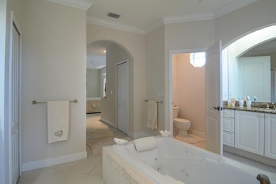 Stunning 3 bedroom, 3.5 pool home situated on an estate lot on Meadowood Golf and Tennis Club in Florida - for sale on GolfHomes.com, golf home, golf lot