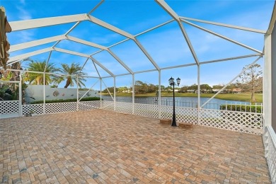 Absolutely Beautiful & stylish LAKEFRONT Divosta built home on Monarch Country Club in Florida - for sale on GolfHomes.com, golf home, golf lot