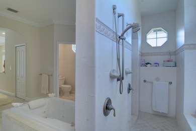 Stunning 3 bedroom, 3.5 pool home situated on an estate lot on Meadowood Golf and Tennis Club in Florida - for sale on GolfHomes.com, golf home, golf lot