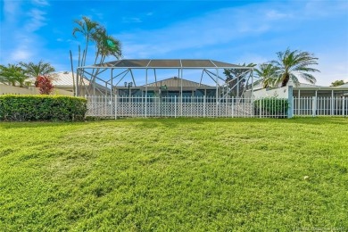 Absolutely Beautiful & stylish LAKEFRONT Divosta built home on Monarch Country Club in Florida - for sale on GolfHomes.com, golf home, golf lot