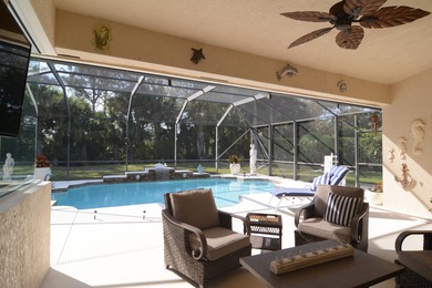 Stunning 3 bedroom, 3.5 pool home situated on an estate lot on Meadowood Golf and Tennis Club in Florida - for sale on GolfHomes.com, golf home, golf lot