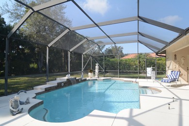 Stunning 3 bedroom, 3.5 pool home situated on an estate lot on Meadowood Golf and Tennis Club in Florida - for sale on GolfHomes.com, golf home, golf lot