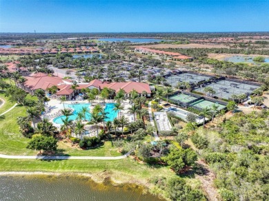 Welcome to 10953 Bullrush Drive, where luxury meets serene golf on Sarasota National Golf Club in Florida - for sale on GolfHomes.com, golf home, golf lot