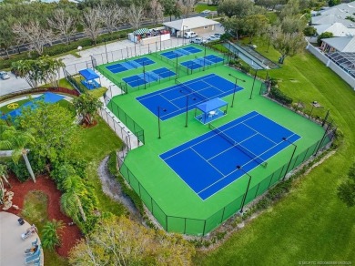 Absolutely Beautiful & stylish LAKEFRONT Divosta built home on Monarch Country Club in Florida - for sale on GolfHomes.com, golf home, golf lot