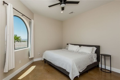 Located at 6322 S Via De Oro, Fort Mohave, Arizona, this on Los Lagos Golf Club in Arizona - for sale on GolfHomes.com, golf home, golf lot