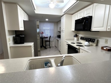 Tastefully decorated and being sold furnished, this meticulously on Tara Golf and Country Club in Florida - for sale on GolfHomes.com, golf home, golf lot