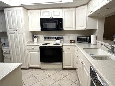 Tastefully decorated and being sold furnished, this meticulously on Tara Golf and Country Club in Florida - for sale on GolfHomes.com, golf home, golf lot