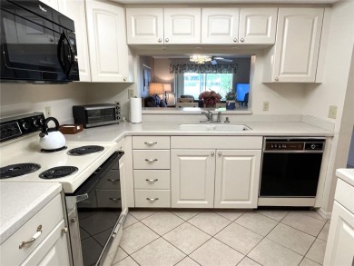 Tastefully decorated and being sold furnished, this meticulously on Tara Golf and Country Club in Florida - for sale on GolfHomes.com, golf home, golf lot