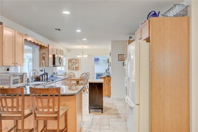 Welcome to this charming 4-bedroom,2-bath home on the Boulder on Boulder City Municipal Golf Course in Nevada - for sale on GolfHomes.com, golf home, golf lot