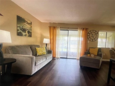 Fabulous 55+ Upstairs FURNISHED TURNKEY condo with great views on Country Club At Silver Springs Shores in Florida - for sale on GolfHomes.com, golf home, golf lot