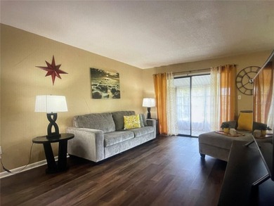 Fabulous 55+ Upstairs FURNISHED TURNKEY condo with great views on Country Club At Silver Springs Shores in Florida - for sale on GolfHomes.com, golf home, golf lot