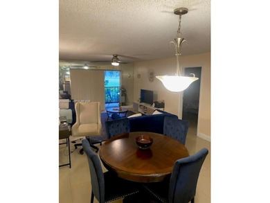 Large 2-bedroom 2-bathroom condominium on the golf course. Guard on Inverrary Country Club in Florida - for sale on GolfHomes.com, golf home, golf lot