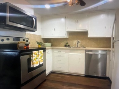 Fabulous 55+ Upstairs FURNISHED TURNKEY condo with great views on Country Club At Silver Springs Shores in Florida - for sale on GolfHomes.com, golf home, golf lot